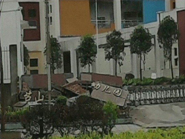 A view of a collapsed building after a 6.6 magnitude earthquake hit southwestern China's Sichuan province