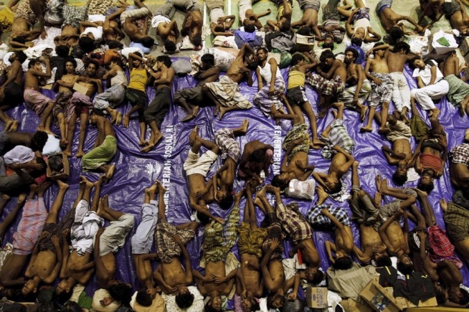 Rescued Rohingya migrants rest inside a shelter at Lhoksukon in Aceh Province, May 11, 2015 Rescued Rohingya migrants rest inside a shelter at Lhoksukon in Aceh Province, May 11, 2015
