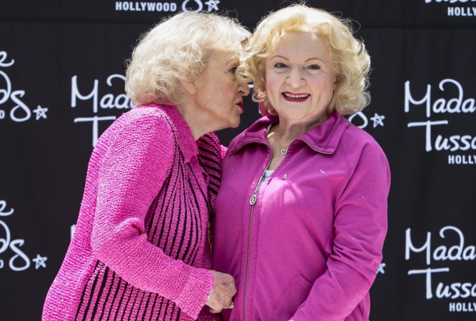Betty White with her wax statue Betty White