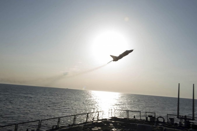 Russian plane near US ship