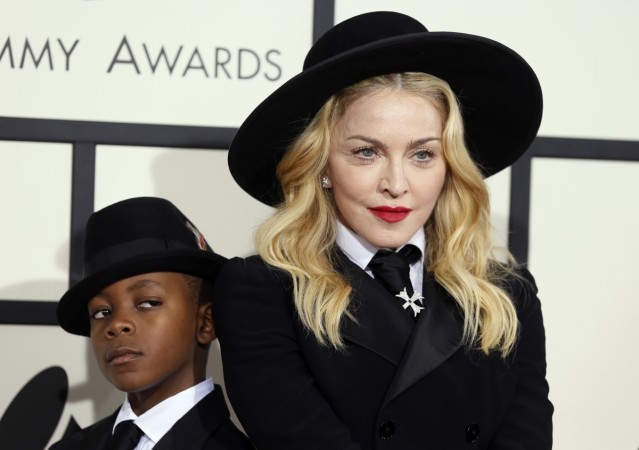 Madonna and her son, David Ritchie, arrive at the 56th annual Grammy Awards