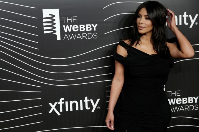 Kim Kardashian West poses as she arrives for the 20th Annual Webby Awards in Manhattan
