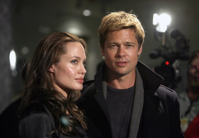 Executive producer Brad Pitt and actress Angelina Jolie attend the premiere of 'God Grew Tired of Us' at the Pacific Design Center in Los Angeles January 8, 2007. The documentary tells the odyssey of three young Sudanese men who embark on a journey to America in search of safety. Brad Pitt and Angelina Jolie in 2007