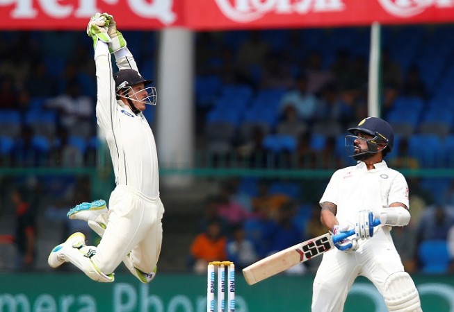 India opener Murali Vijay avoids a bouncer from Trent Boult (not in picture) as New Zealand wicketkeeper fails to stop the ball from going to the boundary, September 22, 2016 BJ Watling Murali Vijay India New Zealand