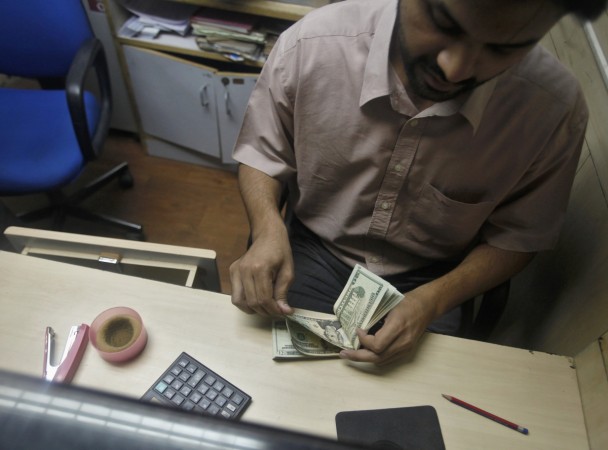 india forex reserves rbi foreign exchange dollar buying importers exporters falling rupee value fii stock buying bse debt market