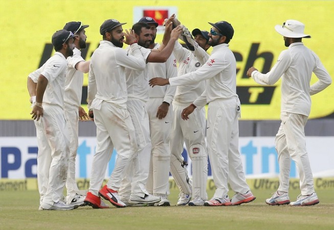 India players celebrate the fall of a New Zealand wicket on Day 4 of the second Test match, October 3, 2016 Shami India Kohli