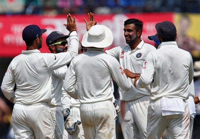 India spearhead R Ashwin celebrates with his teammates after picking up the wicket of New Zealand batsman Ross Taylor, October 10, 2016 R Ashwin India