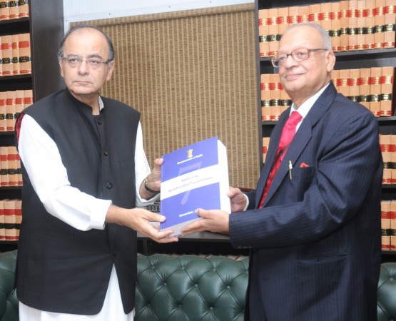 Chairman of the Seventh Pay Commission, Justice A.K. Mathur, submits report to Union Minister for Finance Arun Jaitley, in New Delhi on November 19, 2015. pay commission 7th cpc allowances hike committee arun jaitley india defence forces diwali gift
