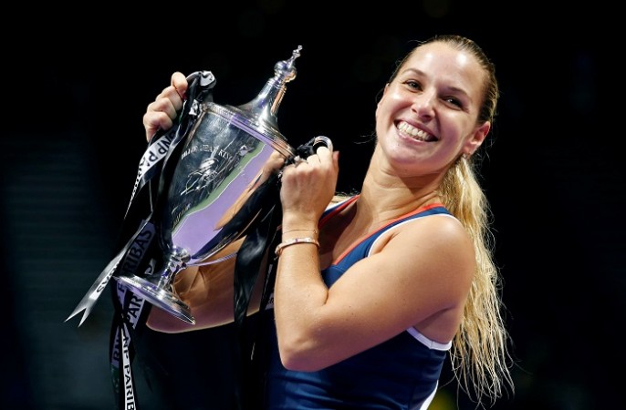 Dominika Cibulkova poses with the WTA Finals trophy after defeating Angelique Kerber, October 30, 2016 Dominika Cibulkova WTA Finals trophy