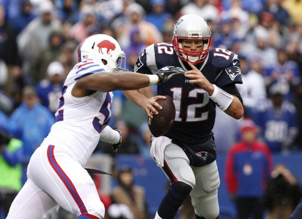 Buffalo Bills inside linebacker Preston Brown (52) sacks New England Patriots quarterback Tom Brady (12) during the first half at New Era Field Tom Brady