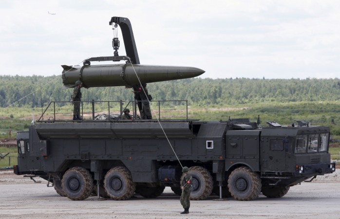 Russian servicemen equip an Iskander tactical missile system at the Army-2015 international military-technical forum in Kubinka, outside Moscow, Russia, June 17, 2015. Russia to deploy nuclear-capable missile