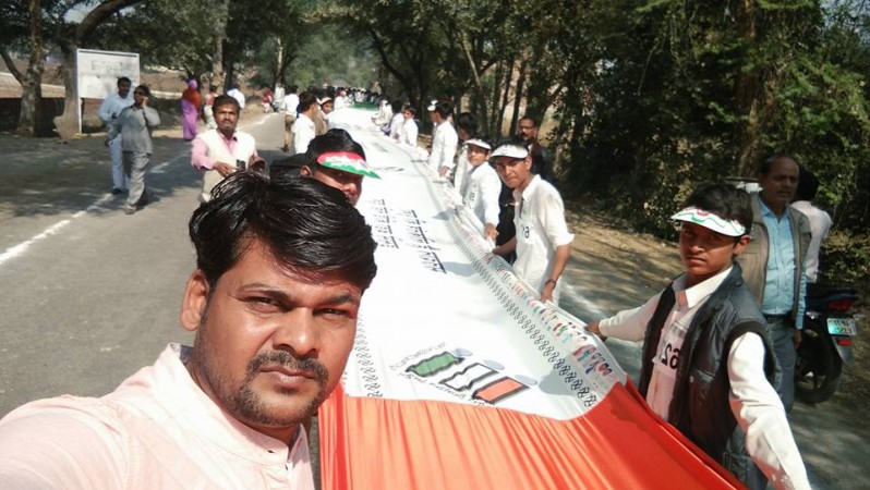 Participants carry a 3-km-long banner in Kanpur Dehat district of Uttar Pradesh. Most people carrying a banner