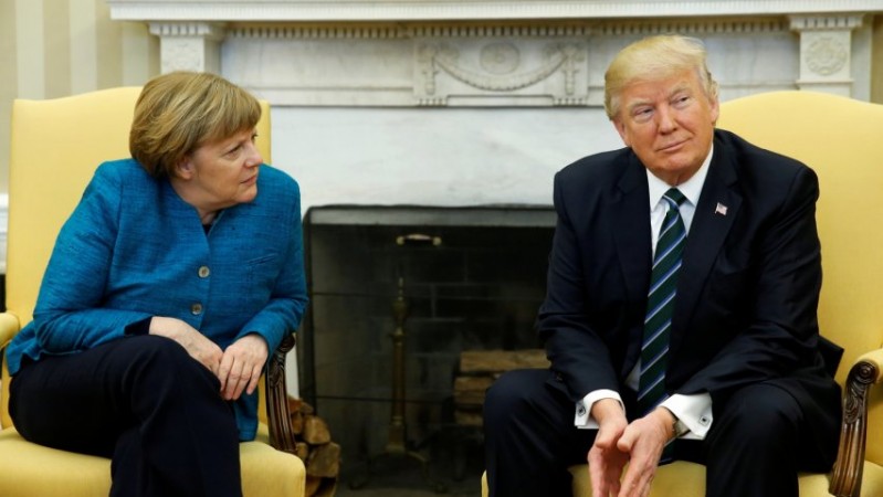 Trump appears to refuse handshake with Angela Merkel