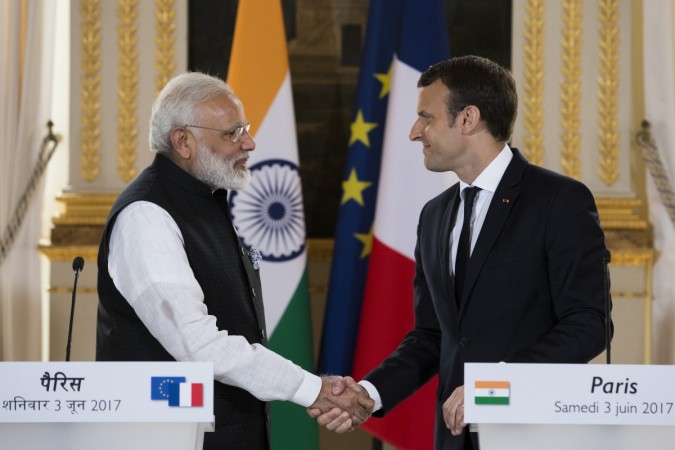 Modi In France Pm Meets President Macron Vows To Continue Fight