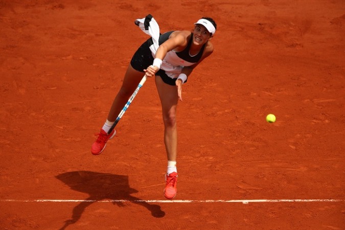 Defending champion Muguruza crashes out of French Open
