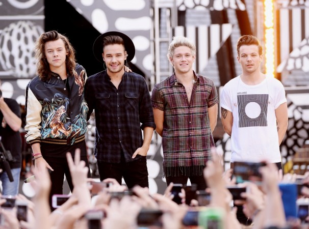 (L-R) Harry Styles, Liam Payne, Niall Horan, and Louis Tomlinson of One Direction perform on ABC's 'Good Morning America' at Rumsey Playfield, Central Park on August 4, 2015 in New York City. One Direction