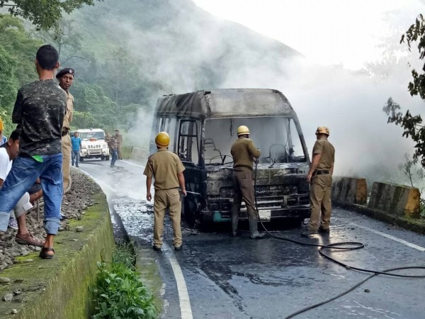 A bus torched allegedly be GJM workers in in Patlebas in Darjeeling district of West Bengal on June 15, 2017. Darjeeling