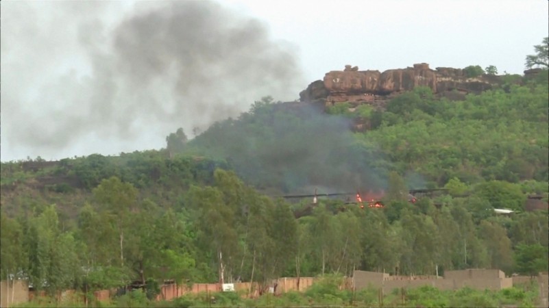 In picture: Flames rise following an attack where gunmen stormed Le Campement Kangaba resort in Dougourakoro, to the east of the capital Bamako, Mali in this still frame taken from video on June 18, 2017. Mali