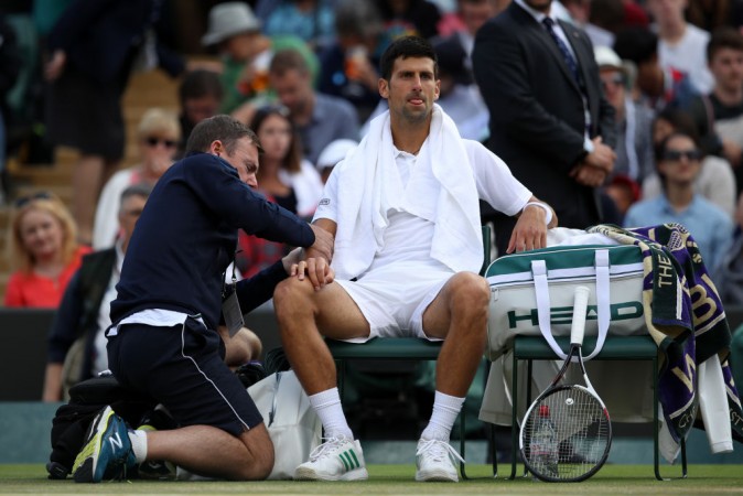 Djokovic to miss rest of the season with right elbow injury Djokovic to miss rest of the season with right elbow injury
