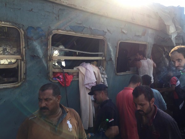 Egyptians search for survivors at the site of a crash where two trains collided near the Khorshid station in Egypt's coastal city of Alexandria, Egypt August 11, 2017. Egypt Train Accident