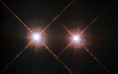 Alpha Centauri group, the closest star system to the Earth is located in the constellation of Centaurus (The Centaur), at a distance of 4.3 light-years. This NASA/ESA Hubble Space Telescope has given us this stunning view of the bright Alpha Centauri A (on the left) and Alpha Centauri B (on the right), shining like huge cosmic headlamps in the dark. The image was captured by the Wide-Field and Planetary Camera 2 (WFPC2).