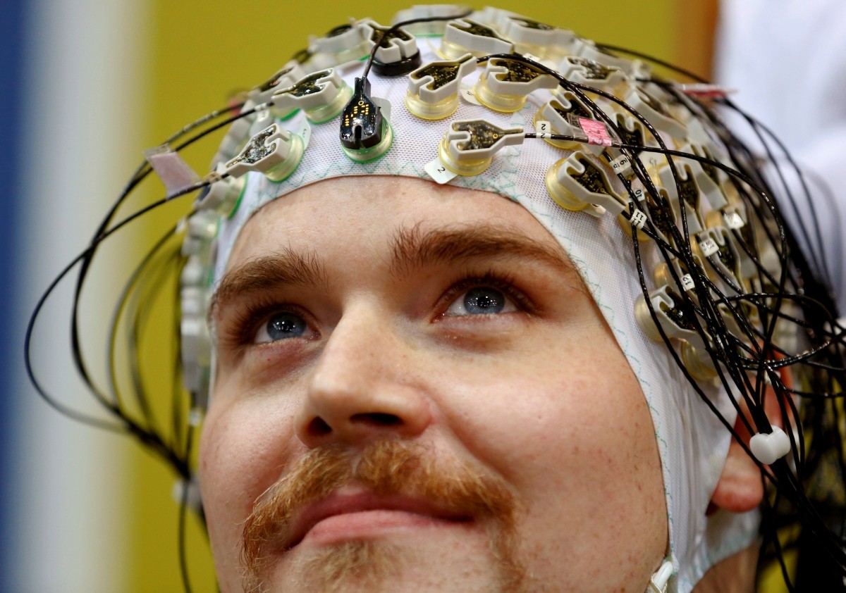 Sebastian Reul of Germany looks up as he competes during the Brain-Computer Interface Race (BCI) at the Cybathlon Championships in Kloten, Switzerland October 8, 2016.