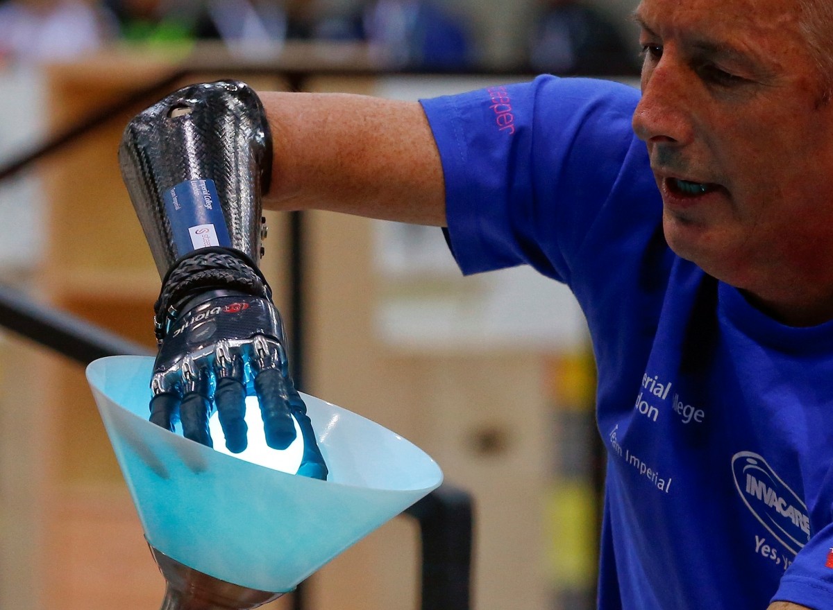 Britain's Kevin Andrew Evison competes during the Powered Arm Prosthesis Race at the Cybathlon Championships in Kloten, Switzerland October 8, 2016.