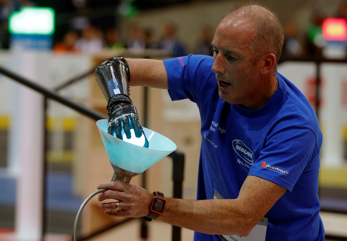 Britain's Kevin Andrew Evison competes during the Powered Arm Prosthesis Race at the Cybathlon Championships in Kloten, Switzerland October 8, 2016.