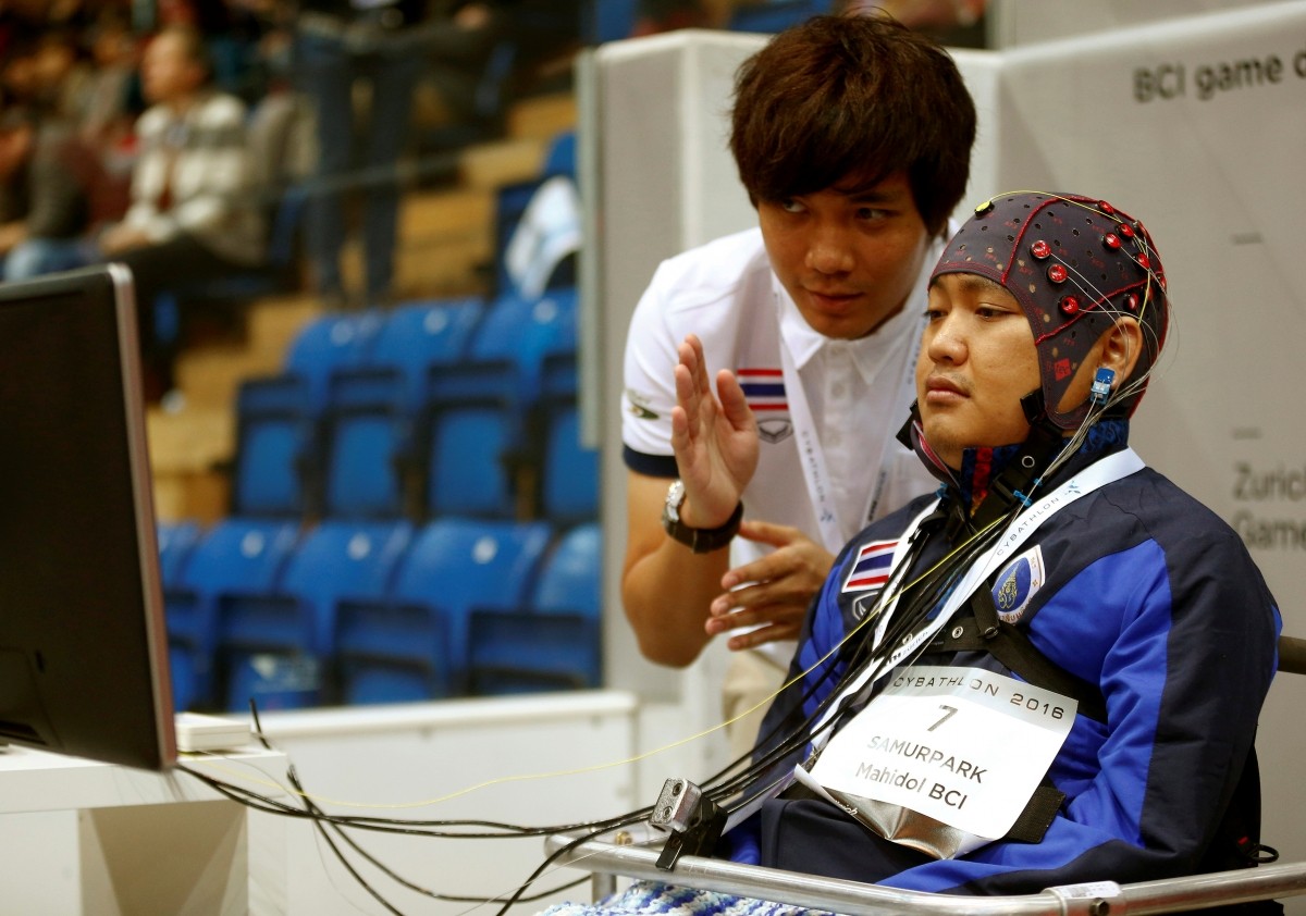 Supawat Samurpark (R) of Thailand competes during the Brain-Computer Interface Race (BCI) at the Cybathlon Championships in Kloten, Switzerland October 8, 2016
