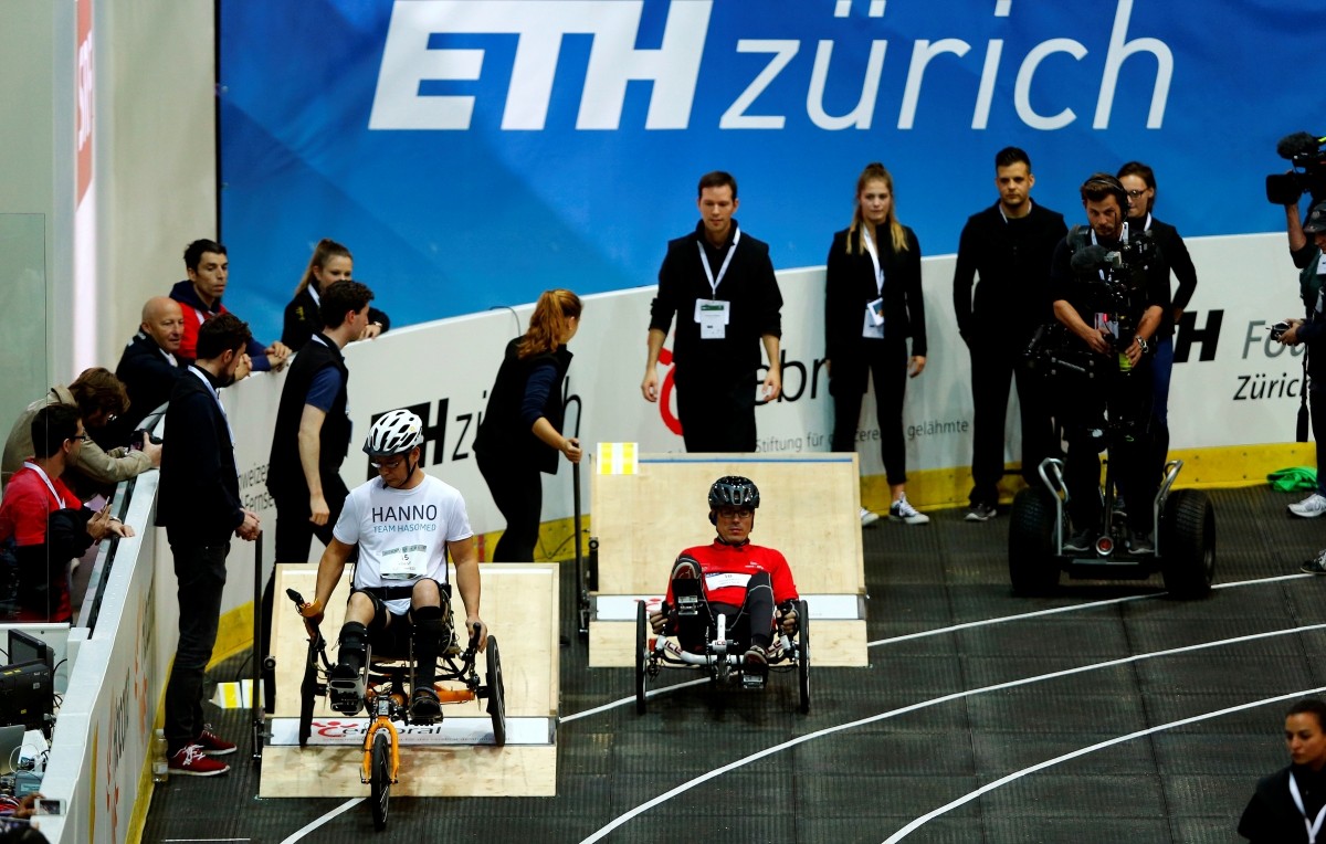 Hanno Voigt (L) of Germany and Julien Jouffroy of Switzerland start during the Functional Electrical Stimulation Bike Race at the Cybathlon Championships in Kloten, Switzerland October 8, 2016.