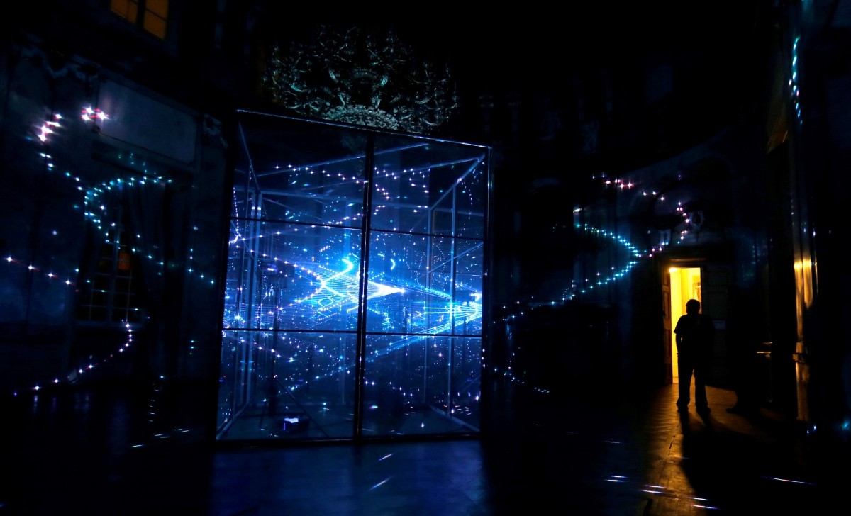 A man looks at the installation