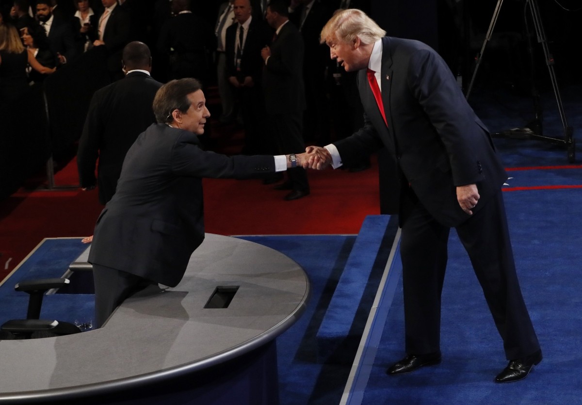 Republican U.S. presidential nominee Donald Trump shakes the hand of debate moderator Chris Wallace after the third and final 2016 presidential campaign debate at UNLV in Las Vegas, Nevada, U.S., October 19, 2016.