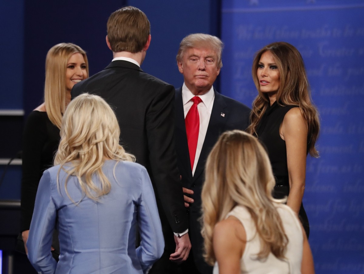 Republican U.S. presidential nominee Donald Trump, his daughter Ivanka (L), son Eric and wife Melania speak after the third and final 2016 presidential campaign debate at UNLV in Las Vegas, Nevada, U.S., October 19, 2016.
