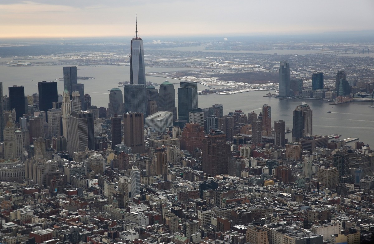 One World Trade Center, the tallest building in the Western Hemisphere, rises over downtown Manhattan as seen from the window of a Customs and Border Protection (CBP), Blackhawk helicopter ahead of Super Bowl XLVIII on January 31, 2014, in New York City. New York