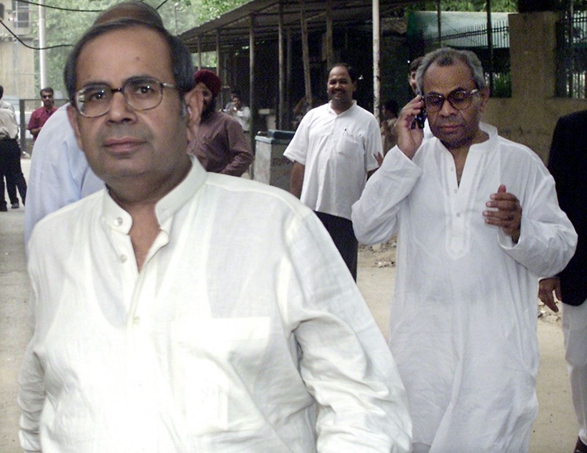 Prakash Hinduja (L), accompanied by his brother Srichand Hinduja (R) of the Hinduja Group. Forbes' list of richest Indians