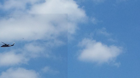 Donald Trump's helicopter was flying overhead, when the witness thought of clicking the photo using his phone. UFO