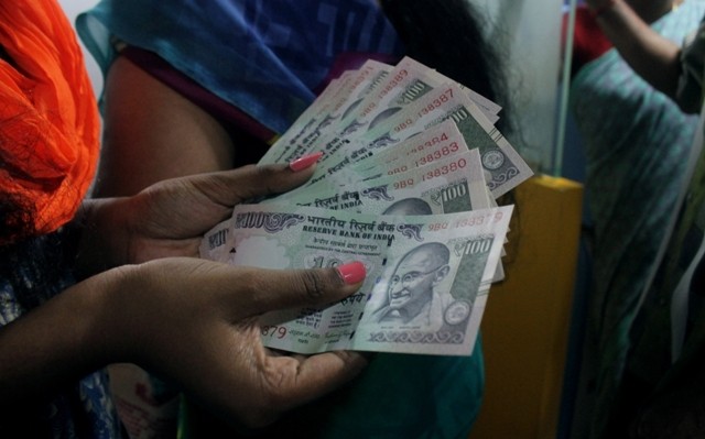 A woman withdraw money from ATM A woman withdraw money from ATM