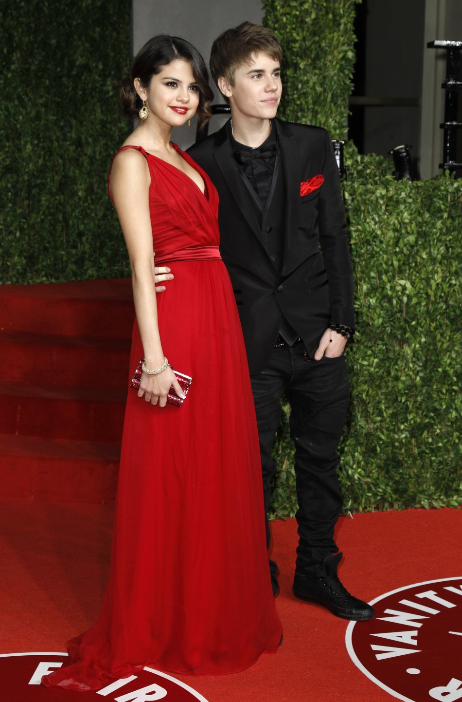 Singers Justin Bieber and Selena Gomez arrive at the 2011 Vanity Fair Oscar party in West Hollywood, California February 27, 2011. Selena, Bieber