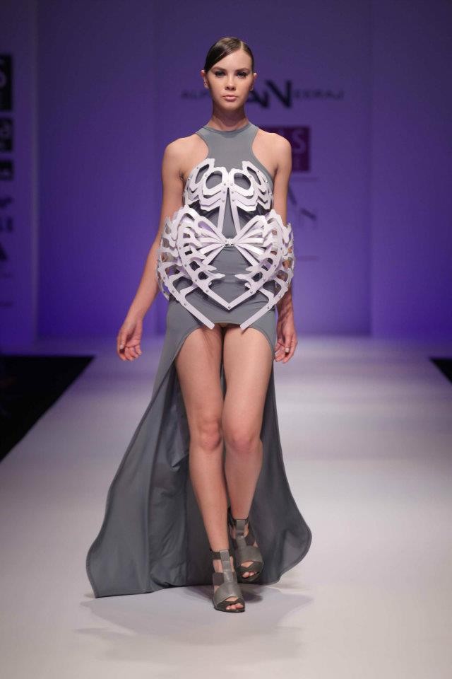 A model walks the ramp during the fourth day of the ongoing Wills Lifestyle India Fashion Week -2012 in New Delhi. Day 4 WIFW