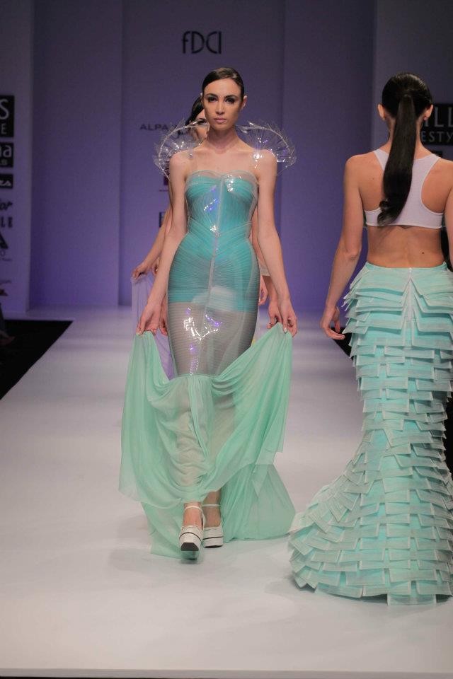 A model walks the ramp during the fourth day of the ongoing Wills Lifestyle India Fashion Week -2012 in New Delhi. Day 4 WIFW