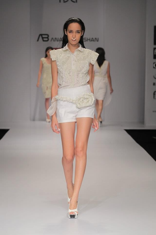 A model walks the ramp during the fourth day of the ongoing Wills Lifestyle India Fashion Week -2012 in New Delhi. Day 4 WIFW