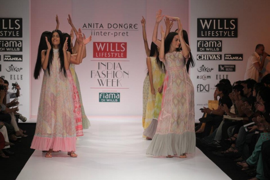 A model walks the ramp during the fourth day of the ongoing Wills Lifestyle India Fashion Week -2012 in New Delhi. Day 4 WIFW