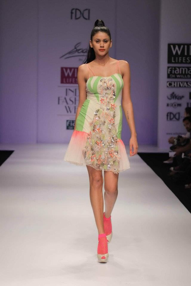 A model walks the ramp during the fourth day of the ongoing Wills Lifestyle India Fashion Week -2012 in New Delhi. Day 4 WIFW
