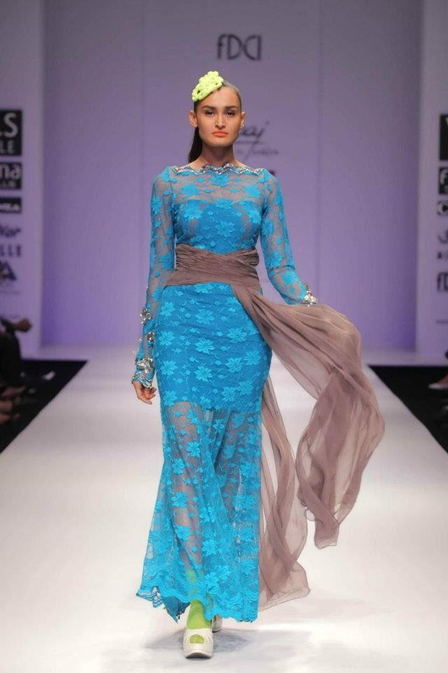 A model walks the ramp during the fourth day of the ongoing Wills Lifestyle India Fashion Week -2012 in New Delhi. Day 4 WIFW
