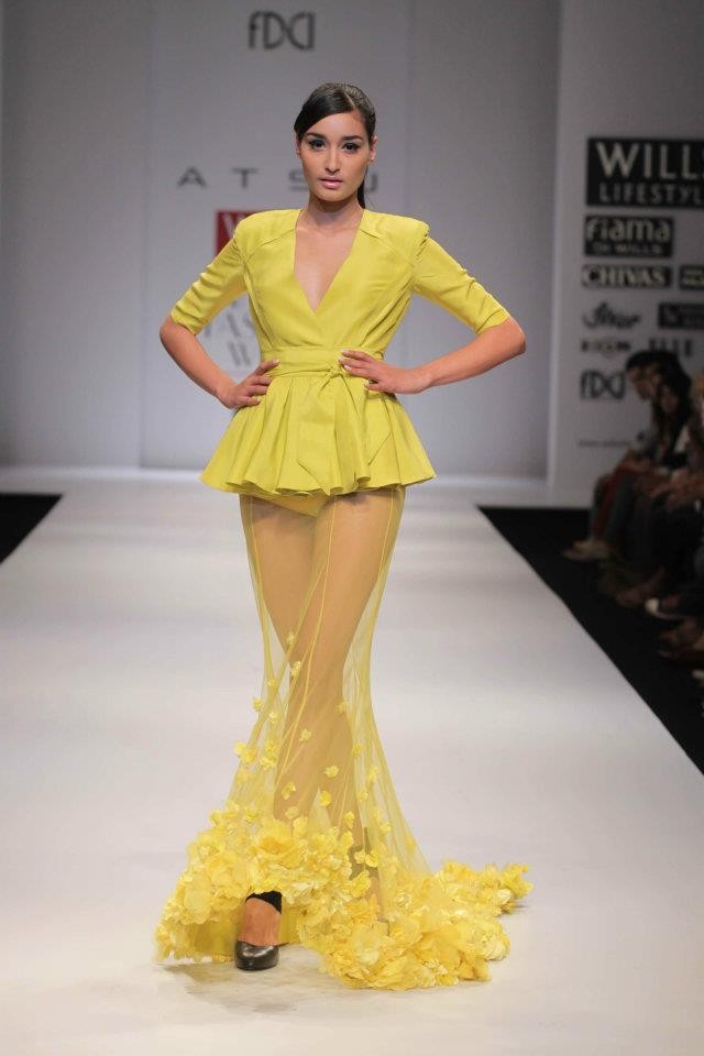A model walks the ramp during the fourth day of the ongoing Wills Lifestyle India Fashion Week -2012 in New Delhi. Day 4 WIFW