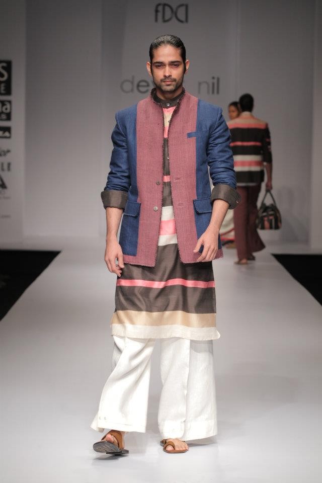 A model walks the ramp during the fourth day of the ongoing Wills Lifestyle India Fashion Week -2012 in New Delhi. Day 4 WIFW
