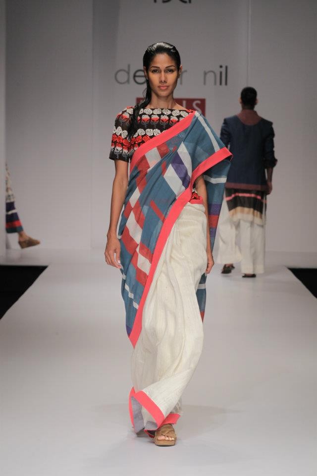 A model walks the ramp during the fourth day of the ongoing Wills Lifestyle India Fashion Week -2012 in New Delhi. Day 4 WIFW