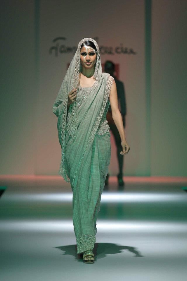 A model walks the ramp during the fourth day of the ongoing Wills Lifestyle India Fashion Week -2012 in New Delhi. Day 4 WIFW