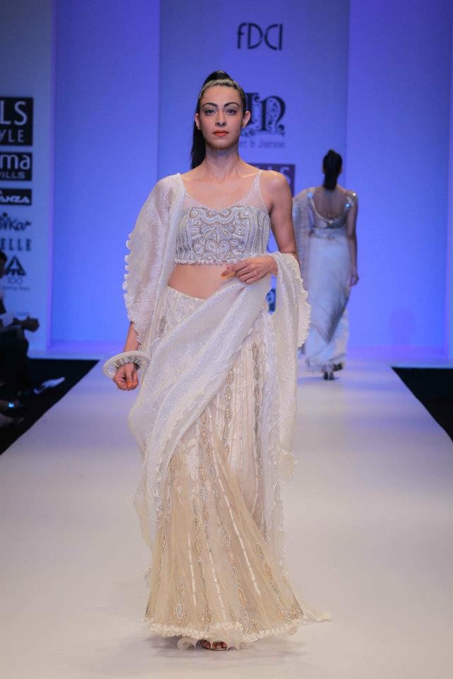 A model walks the ramp during the fourth day of the ongoing Wills Lifestyle India Fashion Week -2012 in New Delhi. Day 4 WIFW