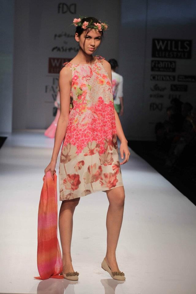 A model walks the ramp during the fourth day of the ongoing Wills Lifestyle India Fashion Week -2012 in New Delhi. Day 4 WIFW